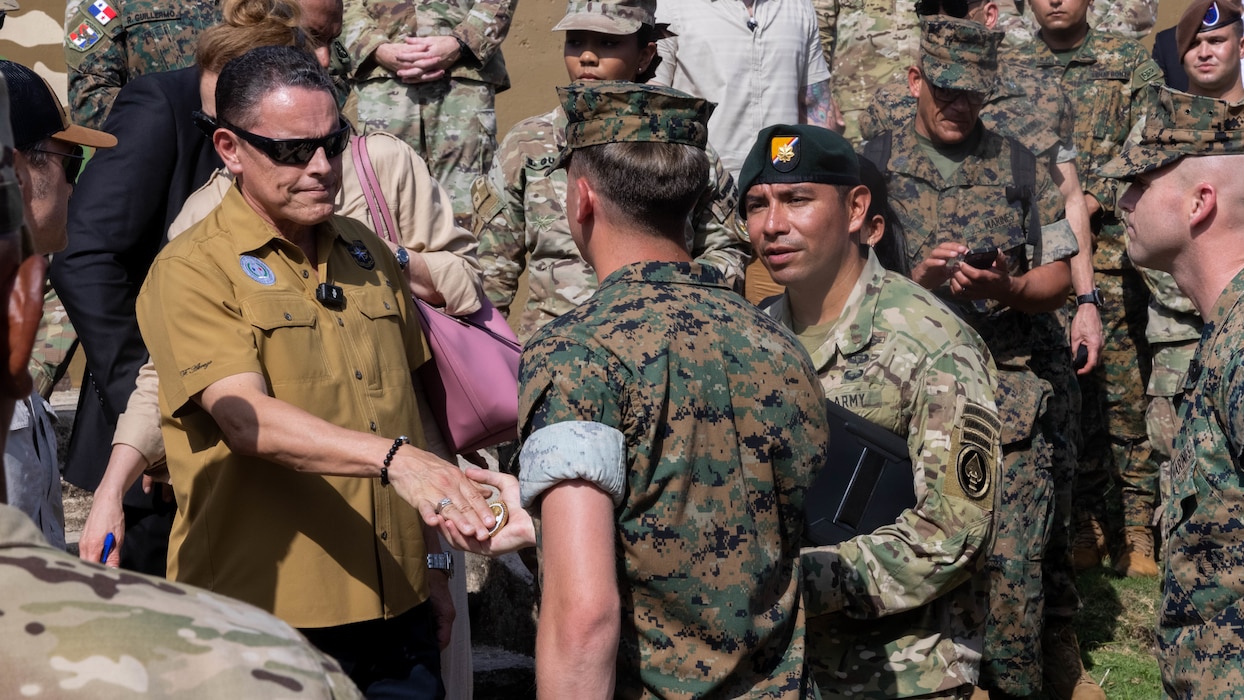 U.S. Marine Corps Cpl. Cannon James, a Laurel, Delaware native and team leader with 1st
Battalion, 8th Marine Regiment, 2d Marine Division receives a challenge coin from Panamanian
Minister of Security Frank Abrego on Fort Sherman, April 8, 2025. U.S. Southern Command is
focused on increasing partner nation capacity and interoperability in the region and reflects the
United States’ enduring promise of friendship, partnership, and solidarity with the Panamanian
people. (U.S. Marine Corps photo by Lance Cpl. Francis Hrosar)