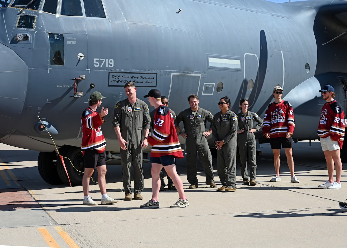 U.S. Airmen assigned to the 79th Rescue Squadron bond with members of Tucson Roadrunners, a local minor league hockey team, at Davis-Monthan Air Force Base, Arizona, April 8, 2025. The 355th Wing supported the hockey team’s local initiatives for positive community relations to build trust and goodwill. (U.S. Air Force photo by Staff Sgt. Abbey Rieves)