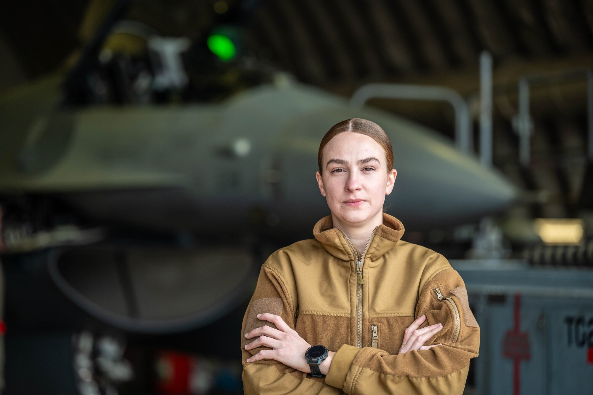 U.S. Air Force Staff Sgt. Alexandria Helms, 36th Fighter Generation Squadron F-16 Fighting Falcon avionics craftsman, poses for a photo at Osan Air Base, Republic of Korea, April 9, 2025. Helms was recognized as Mustang of the Week for her professional commitment in the workplace. (U.S. Air Force photo by Staff Sgt. Christopher Tam)