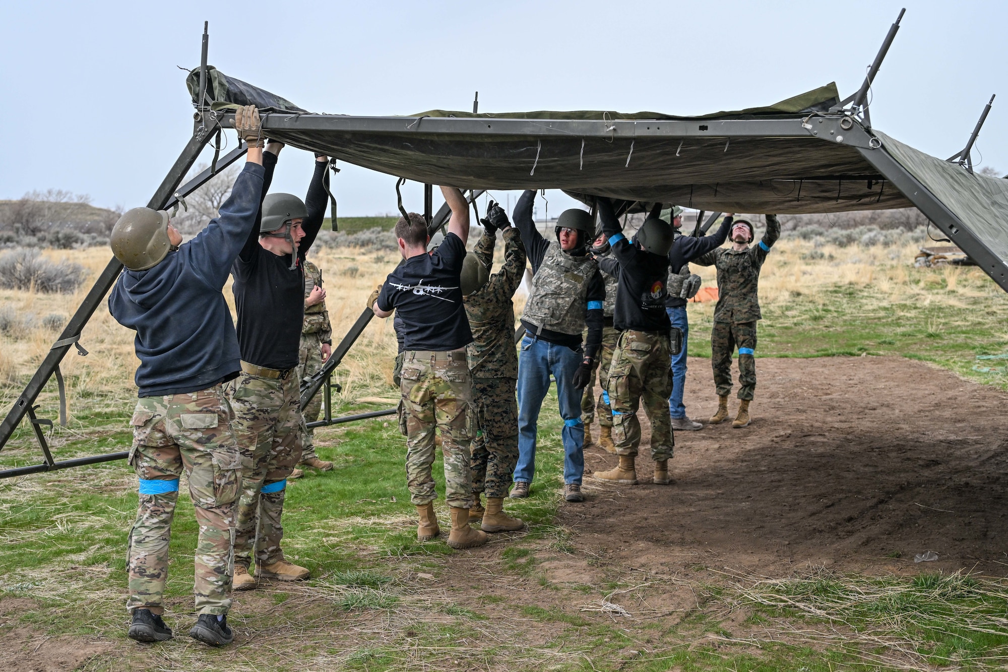 ROTC students build a tented structure