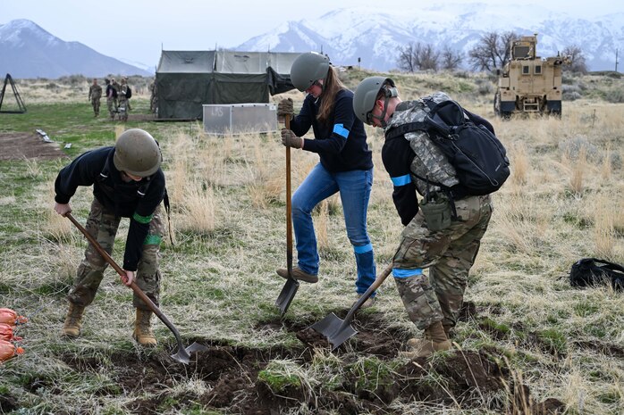ROTC cadets dig trenches