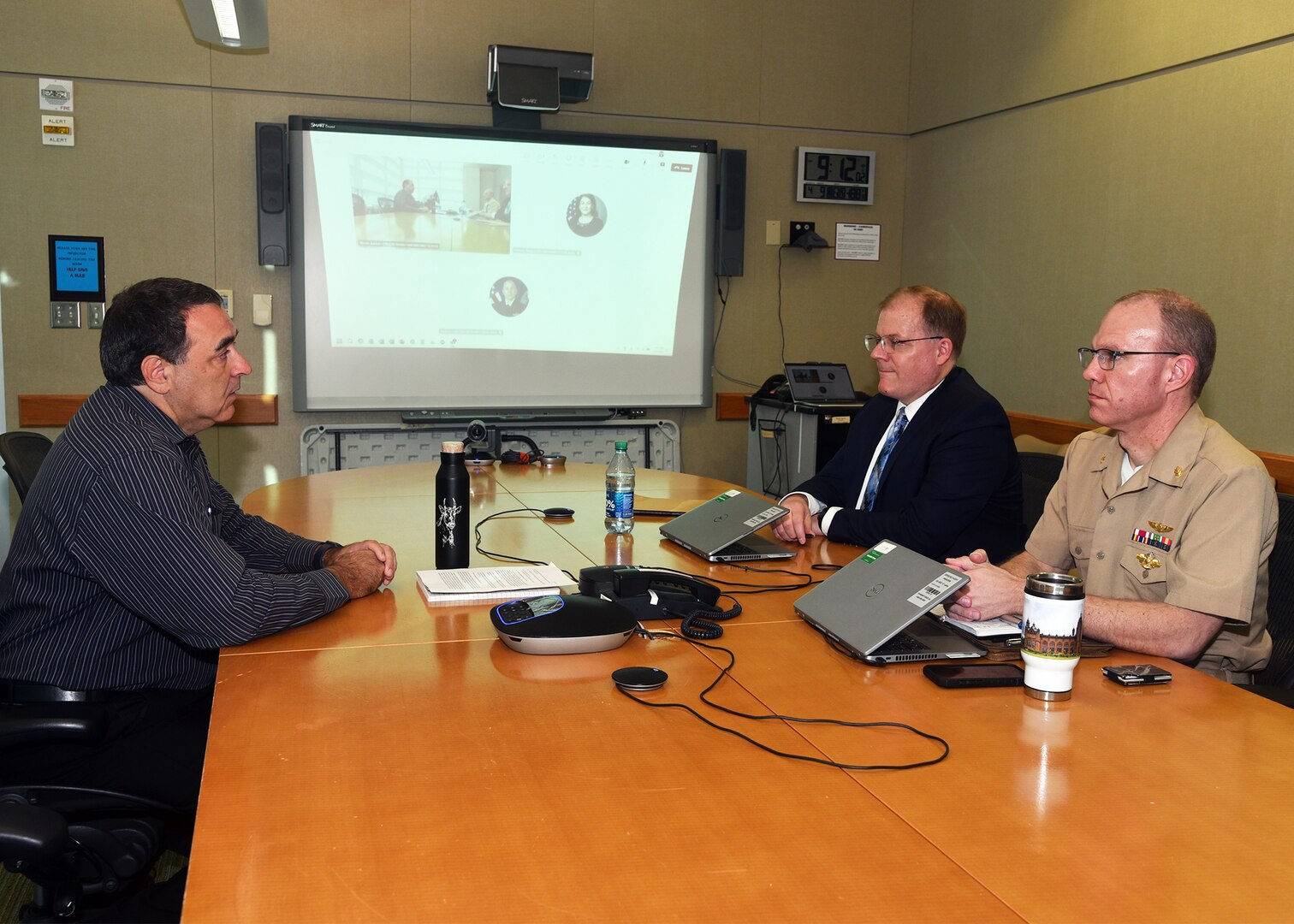 JOINT BASE SAN ANTONIO-FORT SAM HOUSTON – (April 9, 2025) – Dr. William D’Angelo, a principal investigator and director, Directed Energy Health Effects, assigned to Naval Medical Research Unit (NAMRU) San Antonio, speaks with Derek English and Lt. Cmdr. Matt Shipman, military deputy director, Department of the Navy (DON) Human Research Protection Program (HRPP) during a site visit to NAMRU San Antonio at the Battlefield Health and Trauma Research Institute. The DON HRPP is responsible for ensuring human subjects research conducted or supported by U.S. Navy complies with federal, DoD and Navy regulations. Its mission is to ensure the ethical treatment of human subjects in DON-conducted or supported research by promoting adherence to the ethical principles, laws, regulations, and policies that protect human subjects.  NAMRU San Antonio is one of eight research commands within Navy Medicine Research and Development. Its mission is to conduct gap driven combat casualty care, craniofacial, and directed energy research to improve survival, operational readiness, and safety of DoD personnel engaged in routine and expeditionary operations. (U.S. Navy photo by Burrell D. Parmer, NAMRU San Antonio Public Affairs/Released)