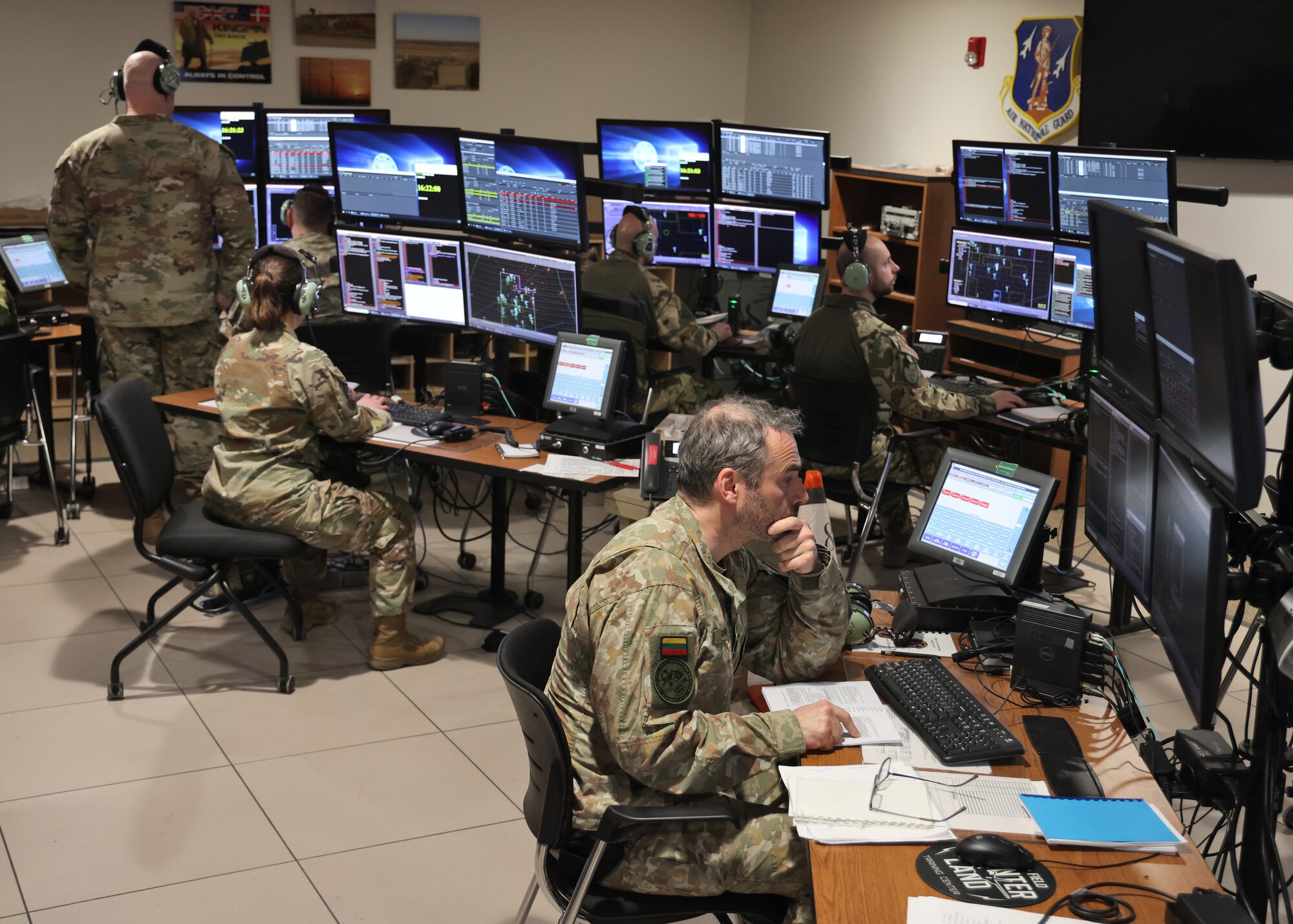 U.S. Airmen assigned to the Wisconsin Air National Guard's 128th Air Control Squadron, fascilitate a training mission for airspace control and surveillance specialists from multiple NATO countries March 31, 2025, at Volk Field Air National Guard Base in Camp Douglas, Wisconsin.