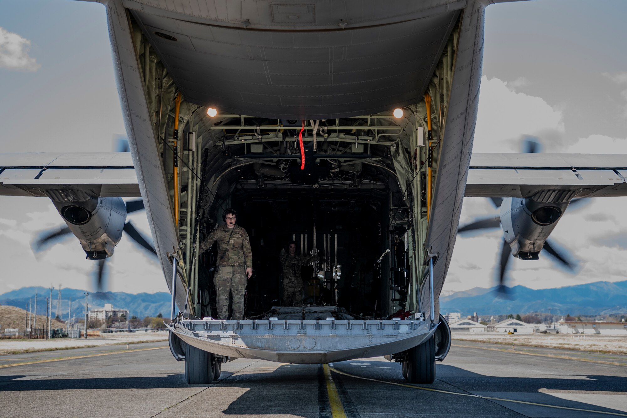 Airman prepares to offload cargo.