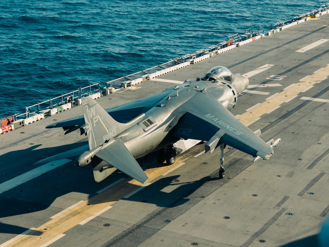 A U.S. Marine Corps AV-8B Harrier with Marine Attack Squadron (VMA) 223 prepares for take-off aboard the Wasp-class amphibious assault ship USS Iwo Jima (LHD 7), Iwo Jima Amphibious Readiness Group (ARG), during Amphibious Squadron 8 (PHIBRON 8), 22nd Marine Expeditionary Unit (MEU) Integration (PMINT) while underway in the Atlantic Ocean April 4, 2025. PMINT is the 22nd MEU’s first opportunity in their pre-deployment training program to fully integrate with PHIBRON 8 while at sea, allowing Marines and Sailors to train together as an ARG/MEU team. (U.S. Marine Corps photo by Sgt. Tanner Bernat)