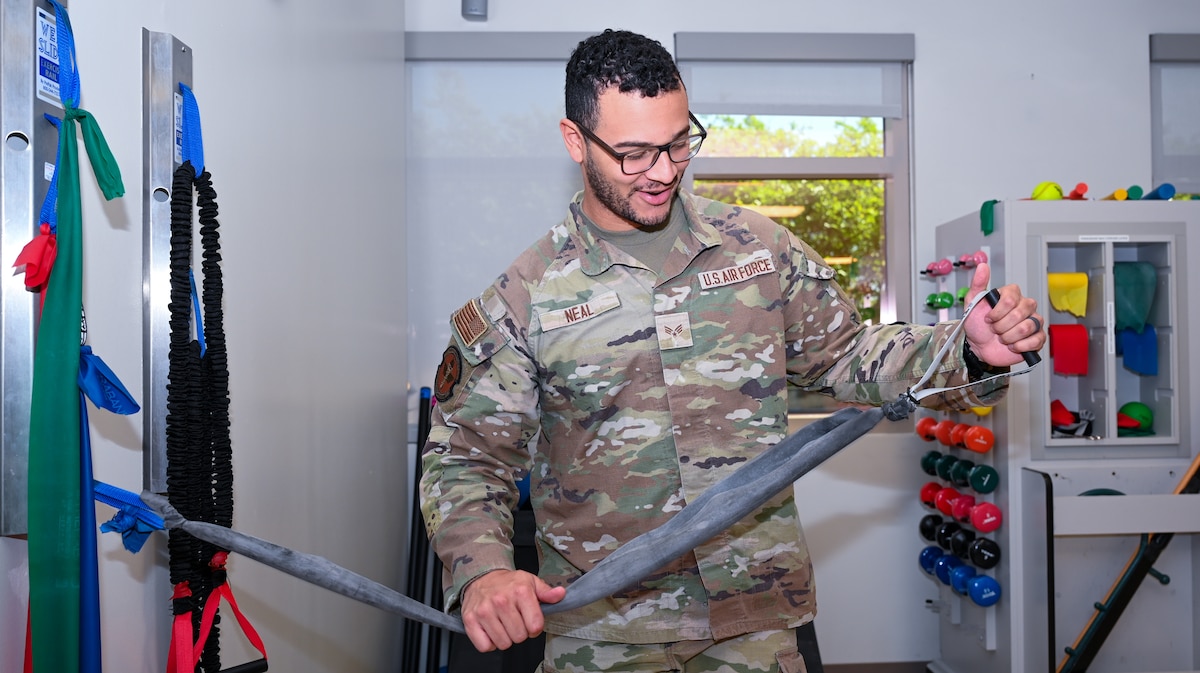 U.S. Air Force Senior Airman Christopher Neal, 42nd Medical Group physical medicine technician, prepares to demonstrate strength training exercise at Maxwell Air Force Base, Alabama, April 8, 2025.