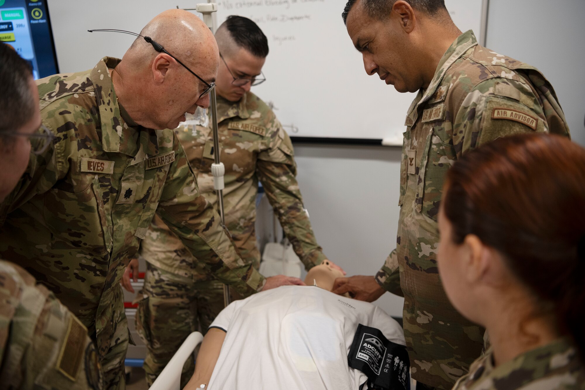 U.S. Air Force Lt. Col. Fransisco Nieves, commander, 156th Medical Group, Puerto Rico Air National Guard, explains medical training procedures to Col. Evaristo Orengo, commander, 156th Wing, during the medical group trauma training simulator lab inauguration at Muñiz Air National Guard Base, Carolina, Puerto Rico, April 6, 2025. The inauguration was conducted by demonstrating the lab's capabilities to 156th Wing leadership and Puerto Rico state guard air members as part of the third phase of a five-phase medical modernization project valued at approximately $160k. (U.S. Air National Guard photo by Master Sgt. Rafael D. Rosa)