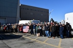 Members of the Naval Foundry and Propeller Center (NFPC) celebrate the delivery of the final propulsor component for the Columbia-class lead ship, the future USS District of Columbia (SSBN 826).