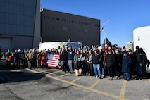 Members of the Naval Foundry and Propeller Center (NFPC) celebrate the delivery of the final propulsor component for the Columbia-class lead ship, the future USS District of Columbia (SSBN 826).