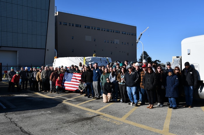 Members of the Naval Foundry and Propeller Center (NFPC) celebrate the delivery of the final propulsor component for the Columbia-class lead ship, the future USS District of Columbia (SSBN 826).
