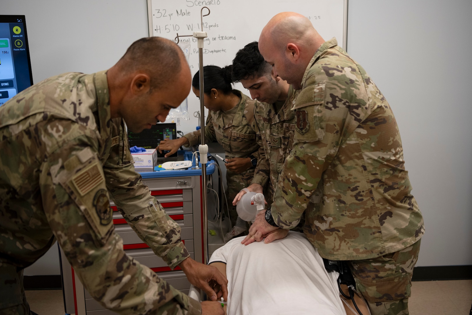 U.S. Airmen assigned to the 156th Medical Group, Detachment 1, Puerto Rico Air National Guard, respond to an emergency scenario with the SimMan 3G Plus mannequin during the medical group trauma training simulator lab inauguration at Muñiz Air National Guard Base, Carolina, Puerto Rico, April 6, 2025.