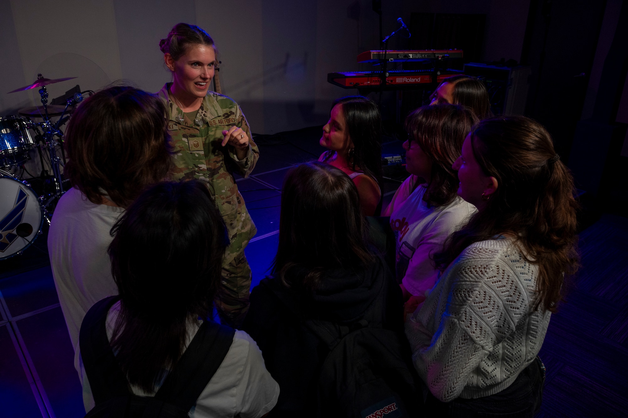 U.S. Air Force Master Sgt. Nadia Sosnoski, the noncommissioned officer in charge of flight operations and a vocalist with The U.S. Air Force Band's Max Impact, connects with students during the Southern California tour at Orange County School of the Arts, Santa Ana, Calif., April 7, 2025. Sosnoski shared her experience becoming a member of the band since her graduation from OCSA in 2008. (U.S. Air Force photo by Hayden Hallman)