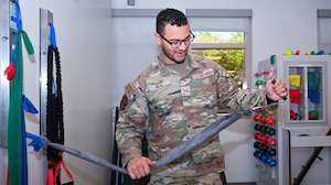 U.S. Air Force Senior Airman Christopher Neal, 42nd Medical Group physical medicine technician, prepares to demonstrate strength training exercise at Maxwell Air Force Base, Alabama, April 8, 2025.