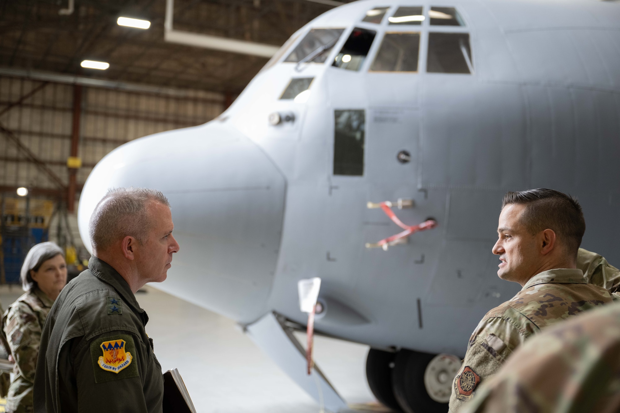 U.S. Air Force Maj. Gen. Charles Bolton, 18th Air Force commander, receives a maintenance mission and infrastructure tour from Maj. Cheyenne Clement, 317th Maintenance Squadron commander, at Dyess Air Force Base, Texas, April 2, 2025. The 18th AF command team spent the day meeting Airmen and touring various facilities across the installation to observe how the 317th Airlift Wing is at the leading edge of tactical airlift. (U.S. Air Force photo by Airman Caleb Schellenberg)