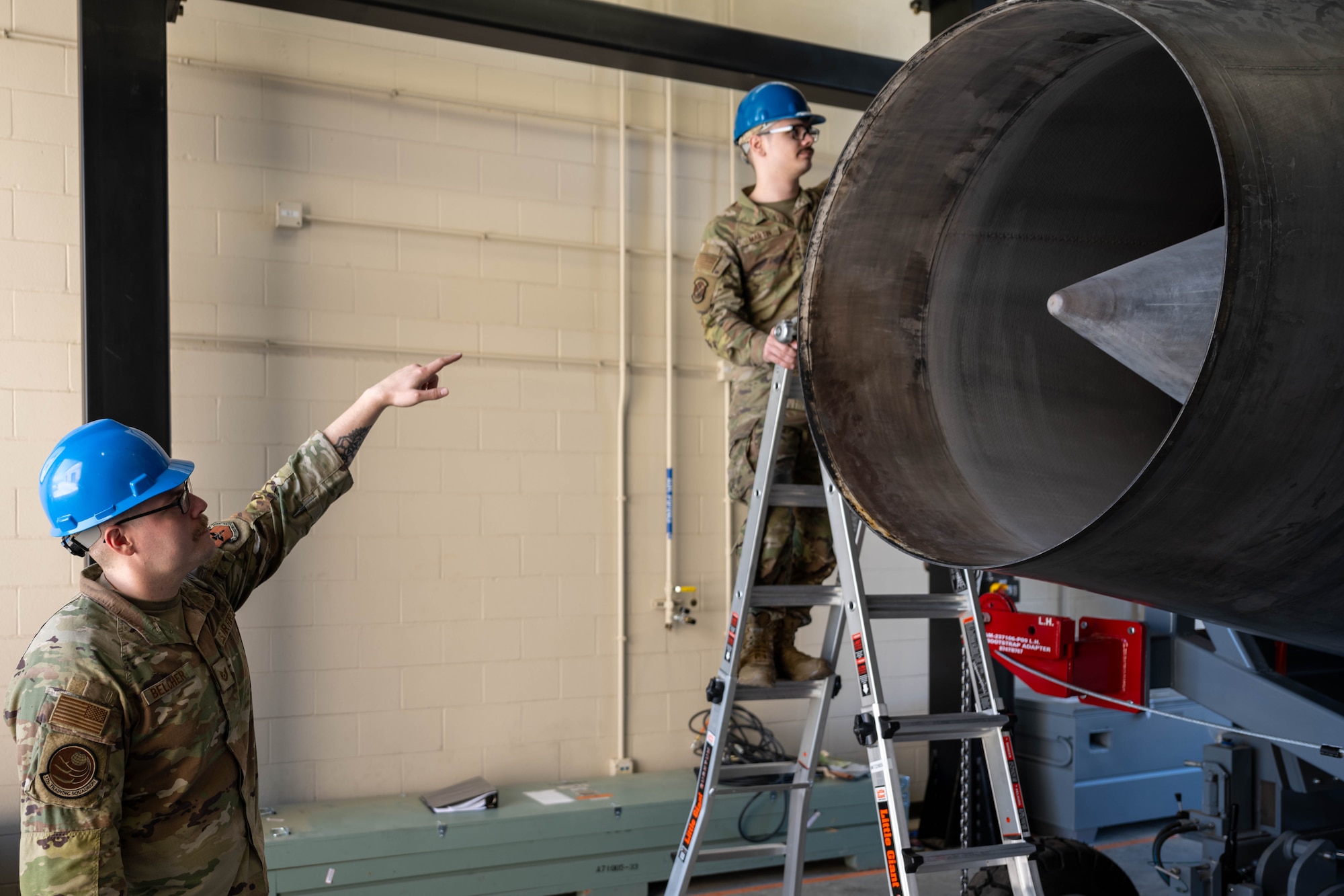 Tech. Sgt. Jason Belcher, 373rd Training Squadron Detachment 8 instructor, provides instruction to Senior Airman Dominic Petrone, 373rd TRS Detachment 8 student, at McConnell Air Force Base, Kansas, April 10, 2025.