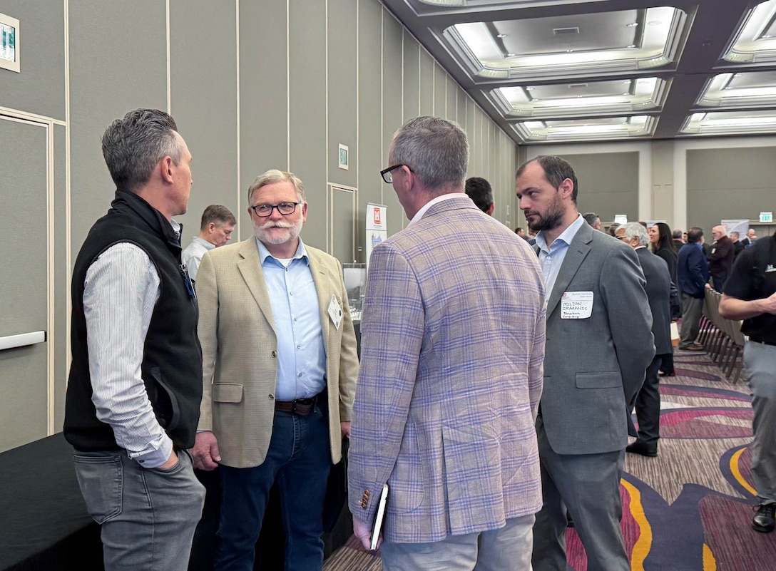 Attendees speak with each other at the annual Business Opportunity Open House hosted by the small business section at the Hyatt Regency in Sacramento, California on March 12, 2025. (U.S. Army photo by Bertha Smith, U.S. Army Corps of Engineers Sacramento District Public Affairs)