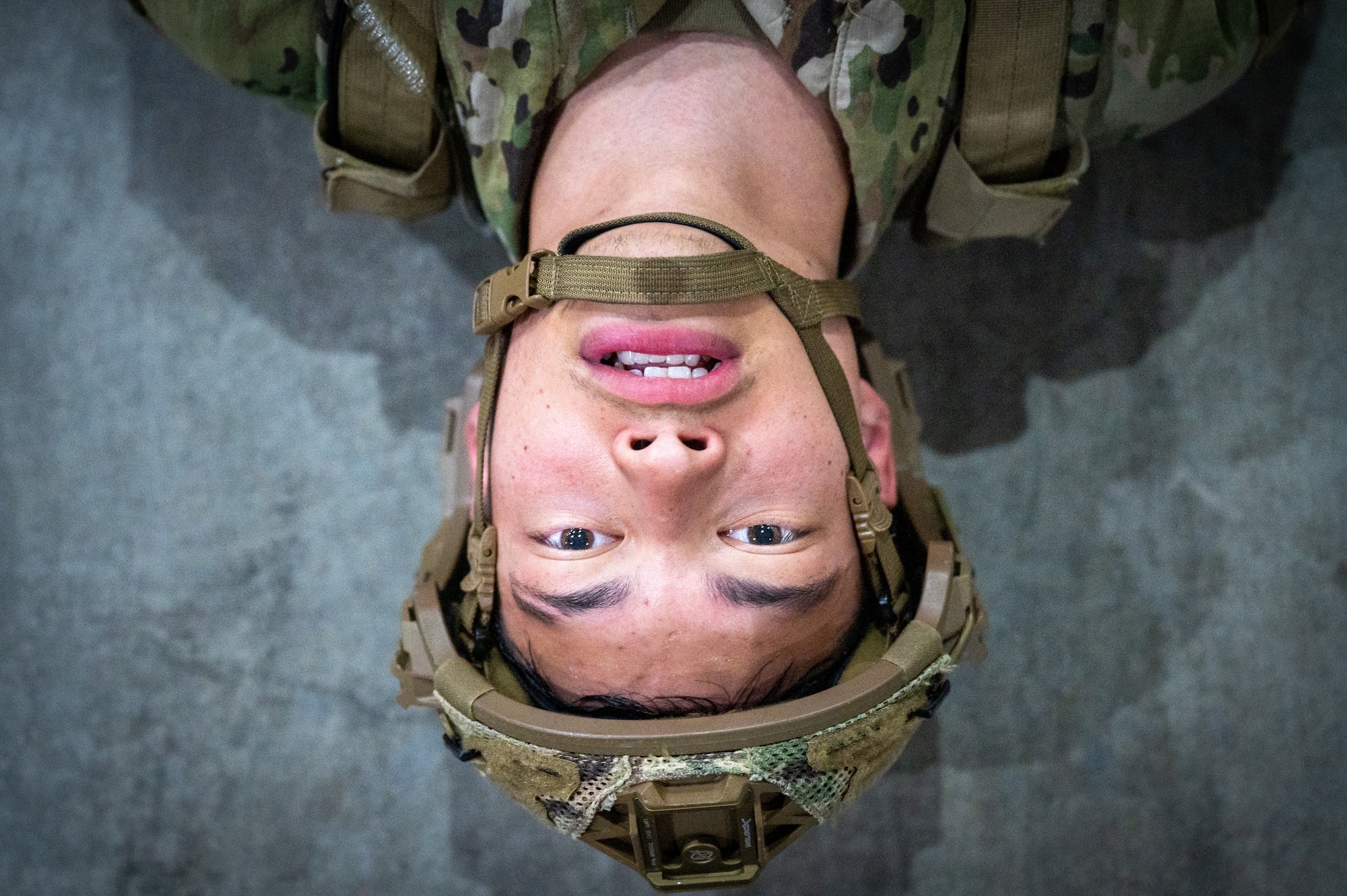 man with military gear and helmet