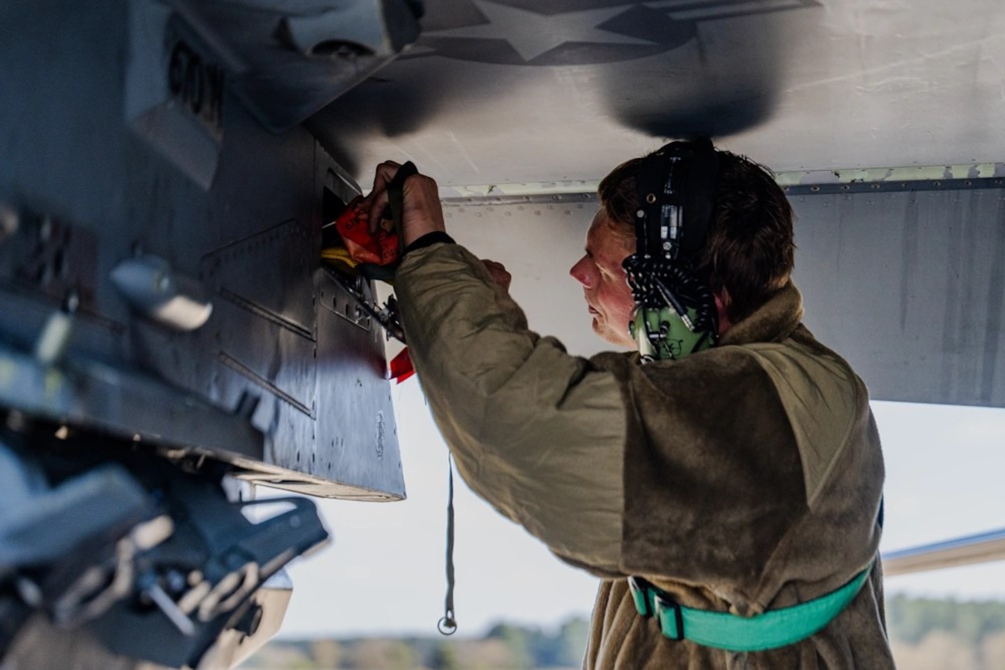 U.S. Air Force Senior Airman Logan Millman, 555th Fighter Generation Squadron weapons load crew member, disarms an F-16 Fighting Falcon from the 555th Fighter Squadron after landing for Combat Archer UK at RAF Lakenheath, England, April 8, 2025. Combat Archer UK was designed to test both the 555th FS and FGS’s skills needed for wartime operational mission readiness. (U.S. Air Force photo by Airman 1st Class Zachary Jakel)