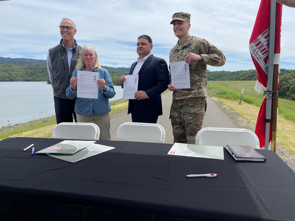 Officials sign a feasibility cost sharing agreement for the Coyote Valley Dam General Investigation Study during an April 11, 2025, ceremony at Lake Mendocino.