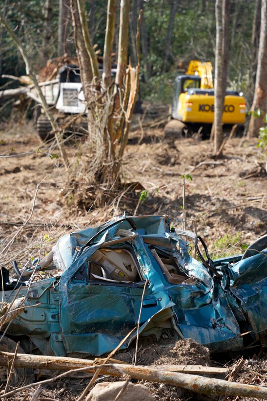 Contractors supporting the U.S. Army Corps of Engineers remove vegetative and manmade debris—including tires and other obstructions—from Bear Creek in Mitchell County, North Carolina, April 8, 2025. The debris removal effort is part of the ongoing Hurricane Helene recovery mission aimed at restoring natural water flow, reducing flood risk, and improving safety for local communities.