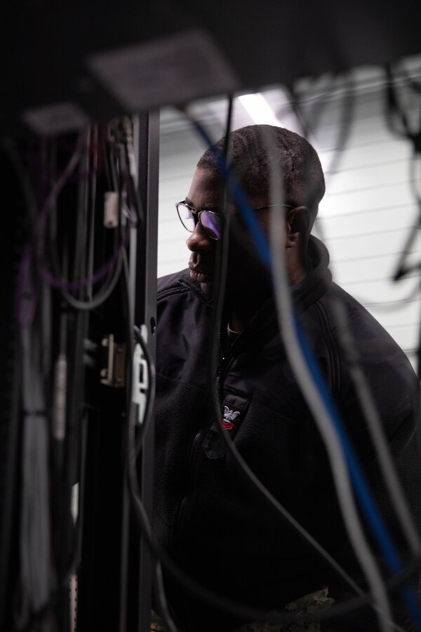 U.S. Navy Interior Communications Electrician 1st Class Nathan Cobb, a technical services manager with Armed Forces Network Iwakuni, and North Carolina native, maintains servers at AFN Iwakuni, Feb 6, 2025. Cobb routinely diagnoses and repairs radio and television broadcasting equipment at AFN Iwakuni to ensure Marines, Sailors and their dependents have uninterrupted access to American radio and television programing as well as command information and news from across the Department of Defense. (U.S. Marine Corps photo by Lance Cpl. Siwan Lewis)