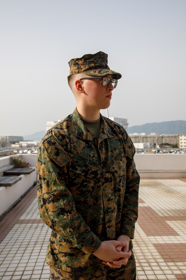 U.S. Marine Corps Sgt. Manuel A. Lopezchavez, the meteorological & oceanographic platoon sergeant with Headquarters and Headquarters Squadron, Marine Corps Air Station Iwakuni, and a native of Florida, poses for a photo after receiving the METOC Marine of the Year Award at MCAS Iwakuni, Japan, March. 25, 2025. Enlisted METOC Marines who have excelled in their field are given the METOC Marine of the Year Award in recognition of their achievement and merit. (U.S. Marine Corps photo by Sgt. Randall Whiteman)