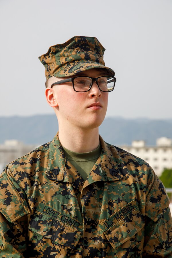 U.S. Marine Corps Sgt. Manuel A. Lopezchavez, the meteorological & oceanographic platoon sergeant with Headquarters and Headquarters Squadron, Marine Corps Air Station Iwakuni, and a native of Florida, poses for a photo after receiving the METOC Marine of the Year Award at MCAS Iwakuni, Japan, March. 25, 2025. Enlisted METOC Marines who have excelled in their field are given the METOC Marine of the Year Award in recognition of their achievement and merit. (U.S. Marine Corps photo by Sgt. Randall Whiteman)