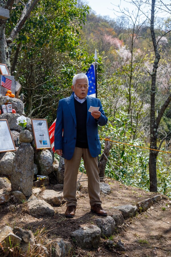 Mr. Kozo Nakagawa, the president of the Fujinowaki Neighborhood Association, thanks the U.S. Marines and Sailors from Marine Corps Air Station Iwakuni for attending the 80th anniversary of the Marukoyama Memorial Ceremony in Kure City, Hiroshima Prefecture, Japan, April. 3, 2025. The Marukoyama Memorial Ceremony is held every year in Kure during cherry blossom season to honor the crew members of the U.S. Navy TBM-3 Avenger, Torpedo Squadron 6, who died in Kure City, Hiroshima Prefecture, Japan, on July 24, 1945. (U.S. Marine Corps photo by Sgt. Randall Whiteman)