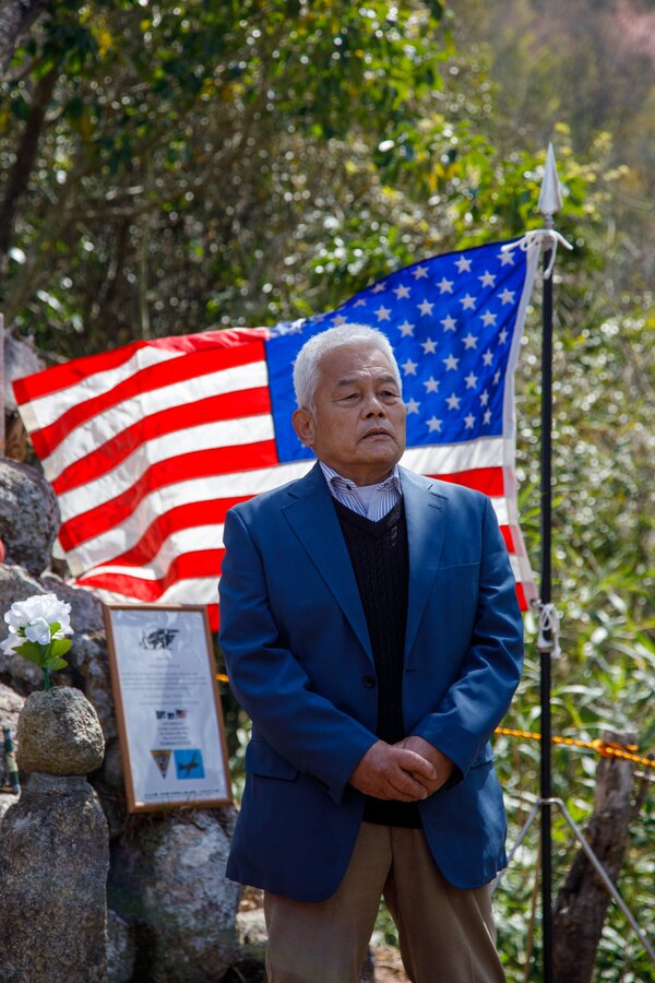 Mr. Kozo Nakagawa, the president of the Fujinowaki Neighborhood Association, thanks the U.S. Marines and Sailors from Marine Corps Air Station Iwakuni for attending the 80th anniversary of the Marukoyama Memorial Ceremony in Kure City, Hiroshima Prefecture, Japan, April. 3, 2025. The Marukoyama Memorial Ceremony is held every year in Kure during cherry blossom season to honor the crew members of the U.S. Navy TBM-3 Avenger, Torpedo Squadron 6, who died in Kure City, Hiroshima Prefecture, Japan, on July 24, 1945. (U.S. Marine Corps photo by Sgt. Randall Whiteman)