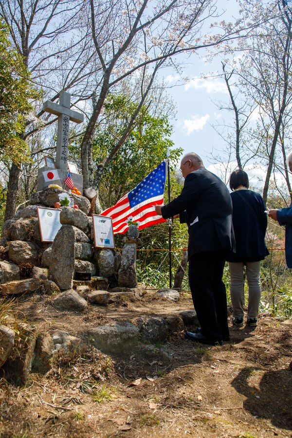 Members of the Fujinowaki Neighborhood Association chant sutras during the 80th anniversary of the Marukoyama Memorial Ceremony in Kure City, Hiroshima Prefecture, Japan, April. 3, 2025. The Marukoyama Memorial Ceremony is held every year in Kure during cherry blossom season to honor the crew members of the U.S. Navy TBM-3 Avenger, Torpedo Squadron 6, who died in Kure City, Hiroshima Prefecture, Japan, on July 24, 1945. (U.S. Marine Corps photo by Sgt. Randall Whiteman)