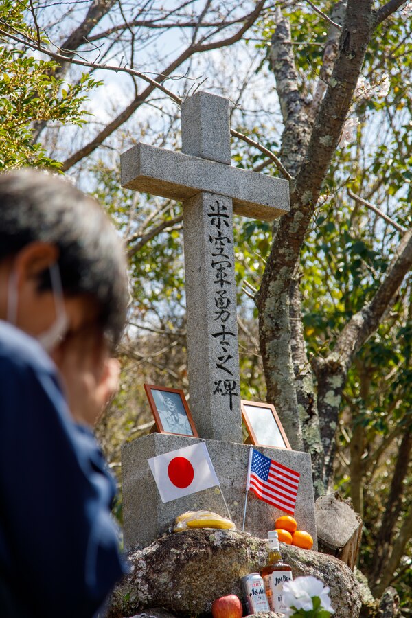 A member of the Fujinowaki Neighborhood Association chants sutras during the 80th anniversary of the Marukoyama Memorial Ceremony in Kure City, Hiroshima Prefecture, Japan, April. 3, 2025. The Marukoyama Memorial Ceremony is held every year in Kure during cherry blossom season to honor the crew members of the U.S. Navy TBM-3 Avenger, Torpedo Squadron 6, who died in Kure City, Hiroshima Prefecture, Japan, on July 24, 1945. (U.S. Marine Corps photo by Sgt. Randall Whiteman)