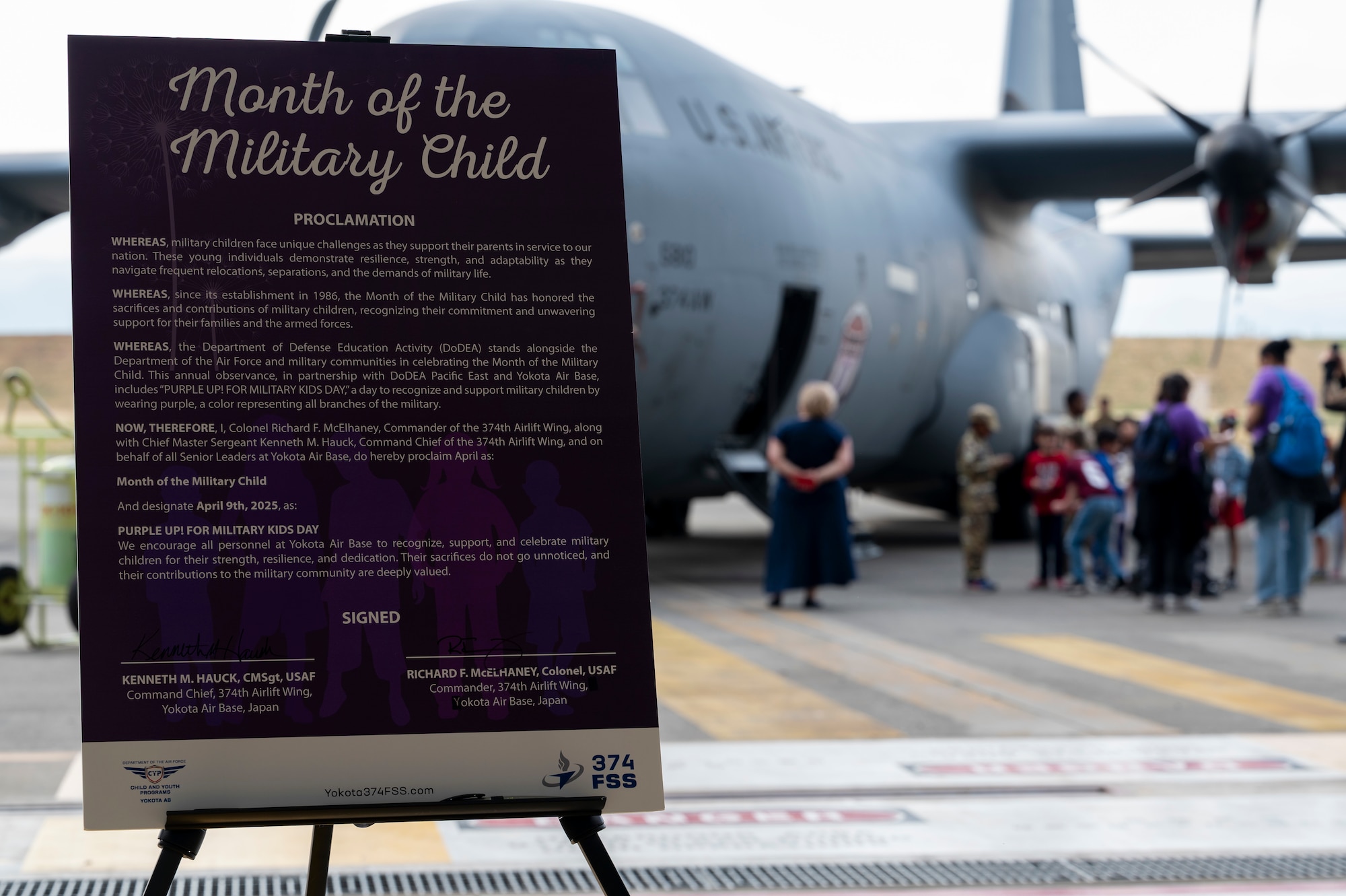 A Month of the Military Child proclamation sign rests on a stand.