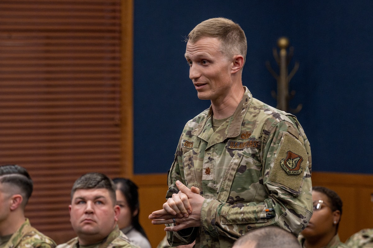 U.S. Air Force Maj. Evan Dicks, 35th Civil Engineer Squadron engineer flight commander, asks Lt. General Stephen Jost, U.S. Forces Japan and Fifth Air Force commander, a question during a mentorship briefing.