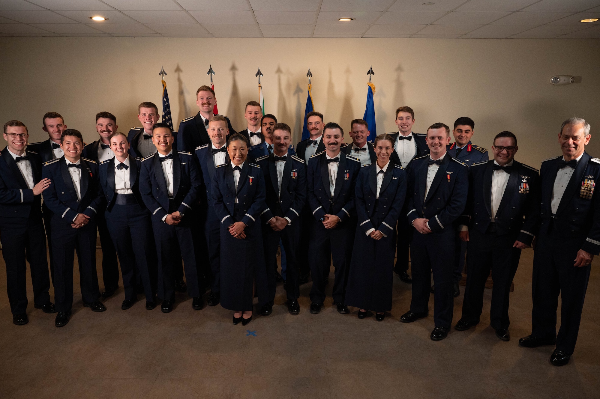 Twenty-one U.S. Air Force officers were awarded silver wings during the ceremony, symbolizing their completion of the Undergraduate Pilot Training program. (U.S. Air Force photo by Senior Airman Keira Rossman)