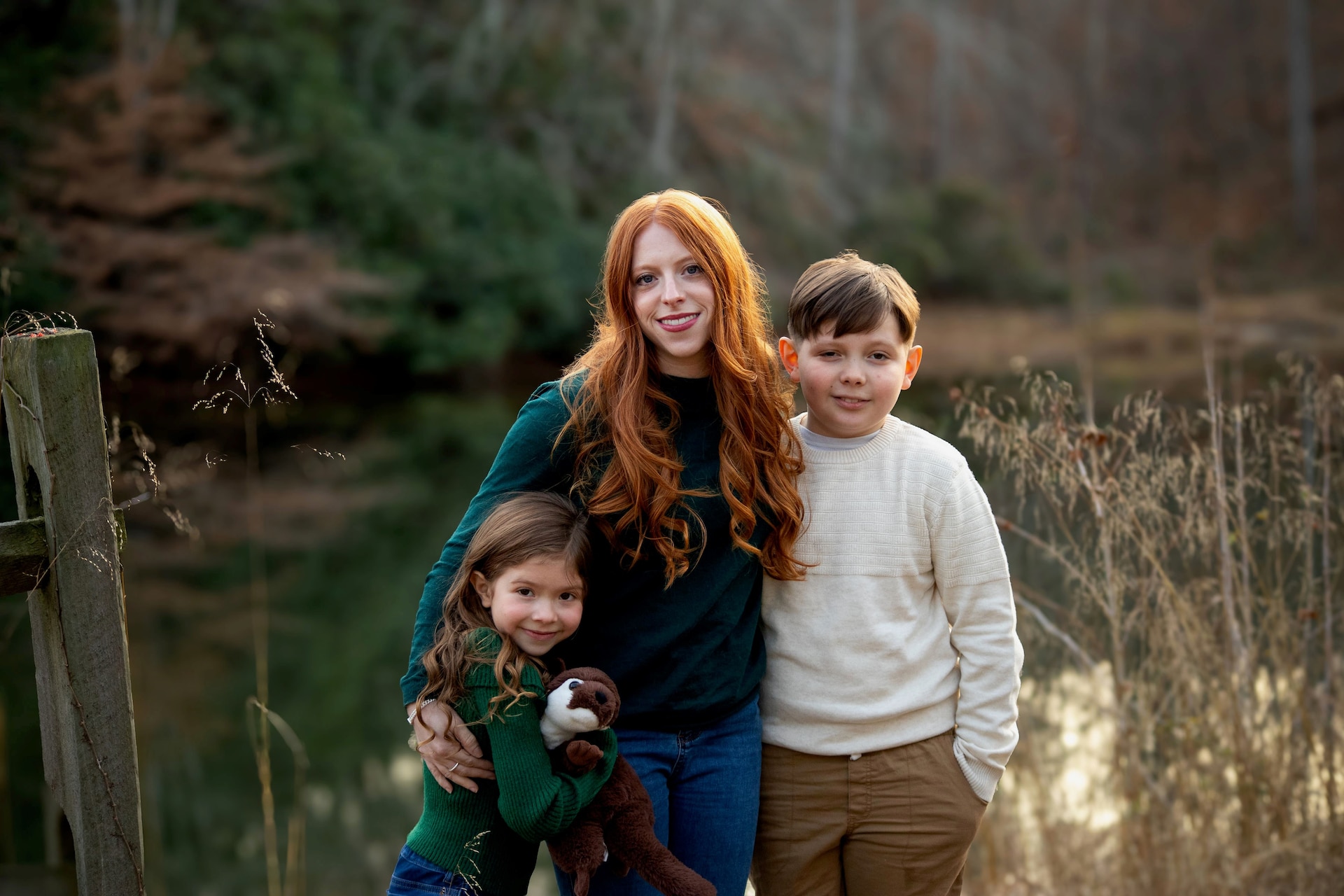 Lisa Lopez poses for camera with her two children