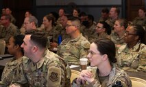 Senior noncommissioned officers sitting in a lecture at the senior NCO Summit. Diverse crowd wearing OCP's