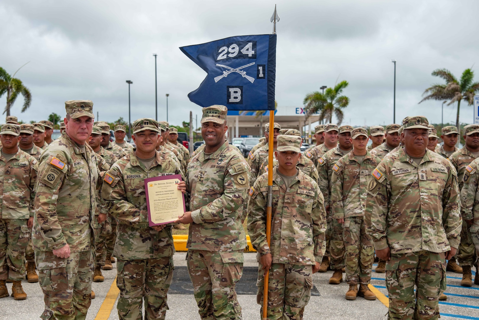 U.S. Army Pacific Commander Gen. Ronald Clark presents the Alexander Hamilton Award to U.S. Army Capt. Tom Borgonia, commander of the Security Forces VII Team Binadu, during an awards ceremony at Guam National Guard Barrigada Readiness Complex, April 12.