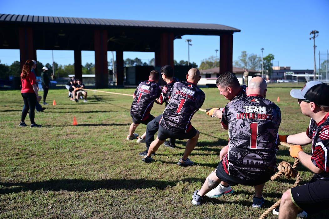 People pull on a rope during a tug-o-war challenge