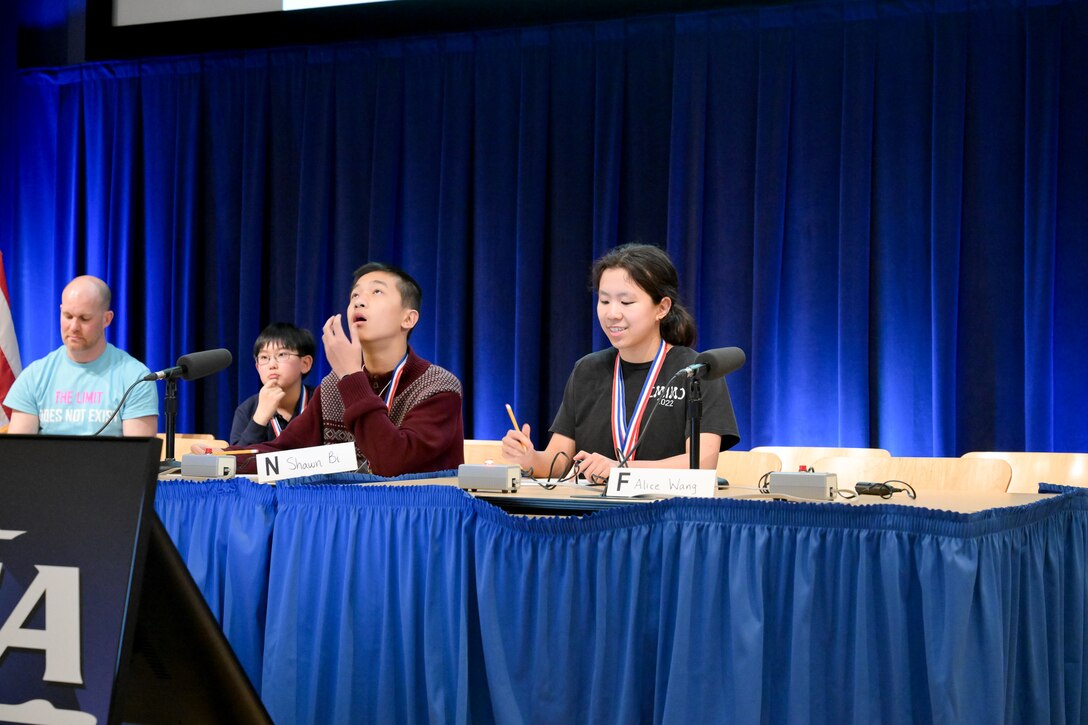 Carderock Math Contest contestants Alice Wang (right) and Shawn Bi (left) go head-to-head in the final countdown round to determine the first-place winner.