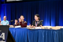 Carderock Math Contest contestants Alice Wang (right) and Shawn Bi (left) go head-to-head in the final countdown round to determine the first-place winner.