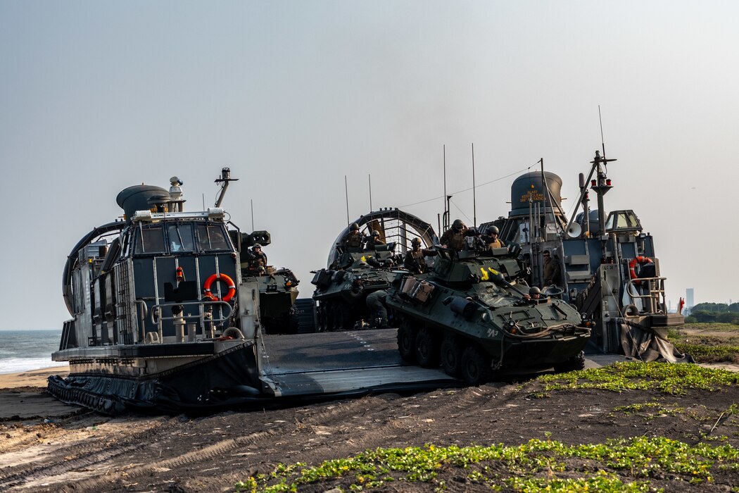U.S. Marines assigned to 1st Light Armored Reconnaissance Battalion, 1st Marine Division, prepare to disembark an Assault Craft Unit (ACU) 5 Landing Craft Air Cushion (LCAC) launched from the Whidbey Island-class dock landing ship USS Comstock (LSD 45) in Light Armored Vehicles (LAV-25)  during a large-scale amphibious landing drill held as part of Exercise Tiger Triumph 2025, at Kakinada Beach, Andhra Pradesh, India, April 11.