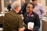 Fern Sumpter Winbush, Defense POW/MIA Accounting Agency principal deputy director, meets with family members during a family member update in New Orleans, April 12, 2025.