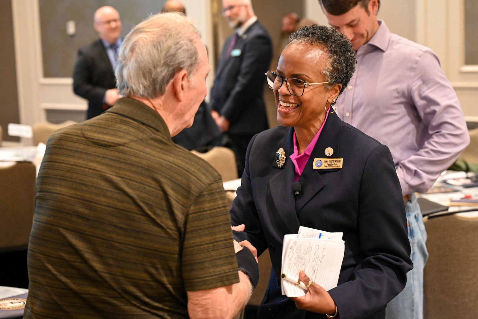 Fern Sumpter Winbush, Defense POW/MIA Accounting Agency principal deputy director, meets with family members during a family member update in New Orleans, April 12, 2025.