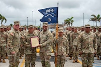 U.S. Army Pacific Commander Gen. Ronald Clark presents the Alexander Hamilton Award to U.S. Army Capt. Tom Borgonia, commander of the Security Forces VII Team Binadu, during an awards ceremony at Guam National Guard Barrigada Readiness Complex, April 12.