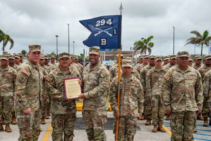 U.S. Army Pacific Commander Gen. Ronald Clark presents the Alexander Hamilton Award to U.S. Army Capt. Tom Borgonia, commander of the Security Forces VII Team Binadu, during an awards ceremony at Guam National Guard Barrigada Readiness Complex, April 12.