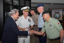 Adm. Samuel J. Paparo, commander of U.S. Indo-Pacific Command, introduces New Zealand Deputy Prime Minister Winston Peters to New Zealand Army WO1 Stephen Rupapere, Deputy Senior Enlisted Leader at USINDOPACOM headquarters, Camp H.M. Smith, Honolulu, April 14, 2025.