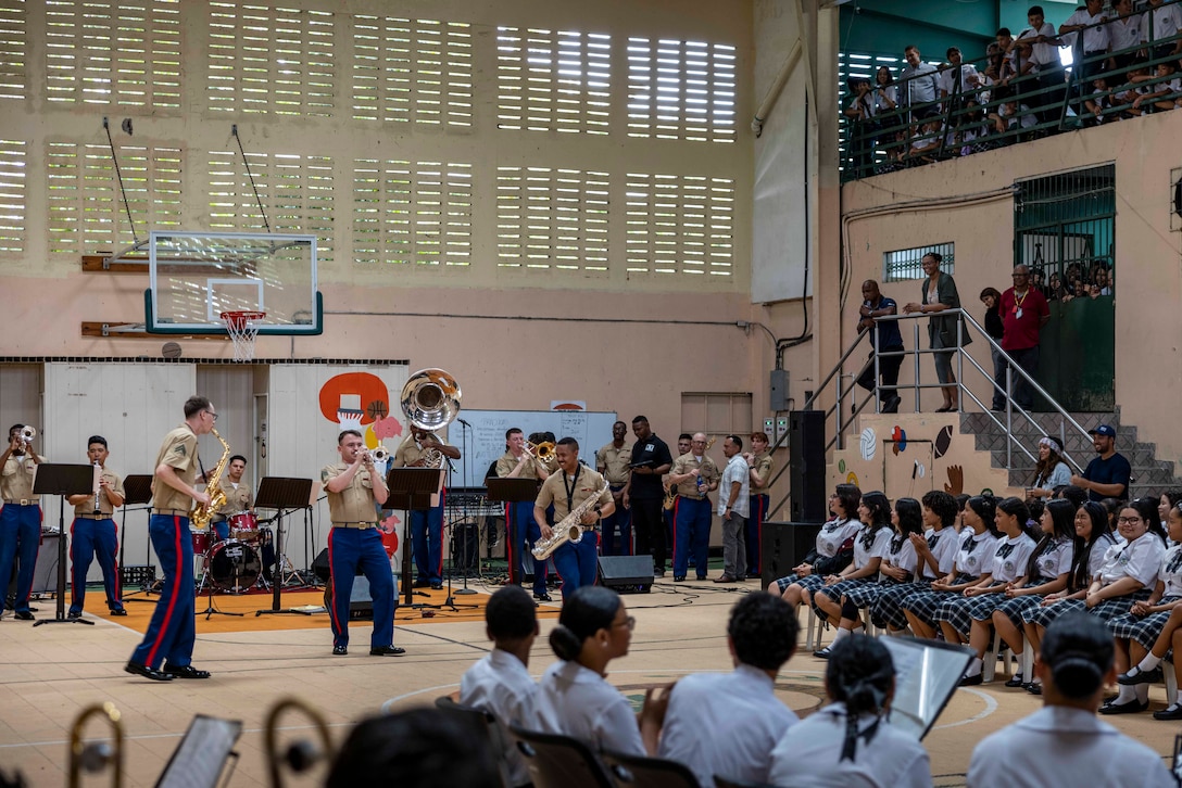 The Marine Forces Reserve Band plays music during a performance at the Centro Bilingue Vista Alegre school in Panama, April 10 2025. The Marine Forces Reserve Band will be performing throughout the week in support of an expanded partnership between the U.S. and Panama. (U.S. Marine Corps photo by Cpl. Samuel Qin)