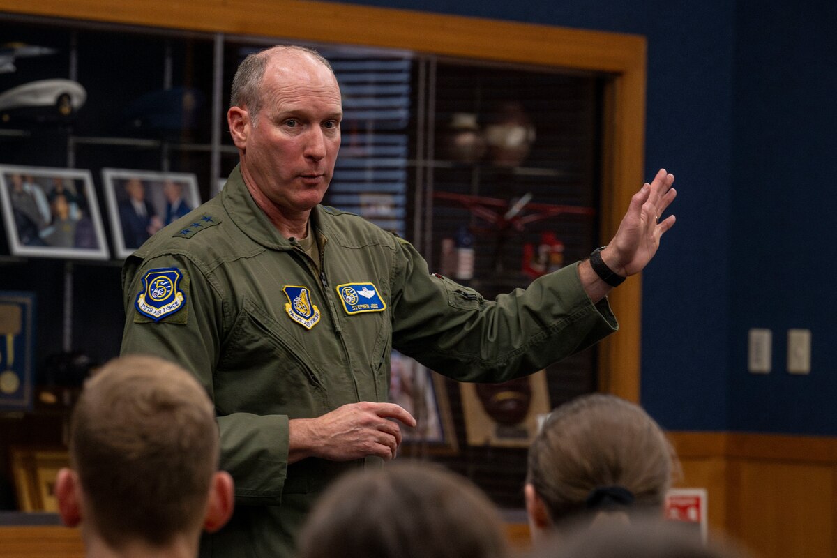 U.S. Air Force Lt. General Stephen Jost, U.S. Forces Japan and Fifth Air Force commander, speaks to a crowd of officers and senior noncommissioned officers during a mentorship briefing.