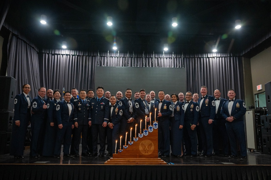 U.S. Air Force chief master sergeants and newly selected chiefs pose for a photo during the 2025 Chief Recognition Ceremony at Osan Air Base, Republic of Korea, April 11, 2025. During the ceremony, four Airmen accepted the rank of chief master sergeant, the highest enlisted rank in the Air Force. (U.S. Air Force photo by Staff Sgt. Christopher Tam)