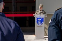 NAVAL SUPPORT ACTIVITY SOUDA BAY, Greece (April 3, 2025) Lt. Katelyn Pekala, director, facilities engineering and acquisition division, Naval Facilities Engineering Systems Command, Navy Region Europe, Africa, Central, Public Works Department, speaks during a ribbon cutting ceremony for the P144 Marathi Logistics Support Center at the NATO Marathi Pier Complex, Souda Bay, Greece, on April 3, 2025. NSA Souda Bay is an operational ashore installation that enables and supports U.S., Allied, Coalition, and partner nation forces to preserve security and stability in the European, African, and Central Command areas of responsibility. (U.S. Navy photo by Mass Communication Specialist 2nd Class Andrew Eder)